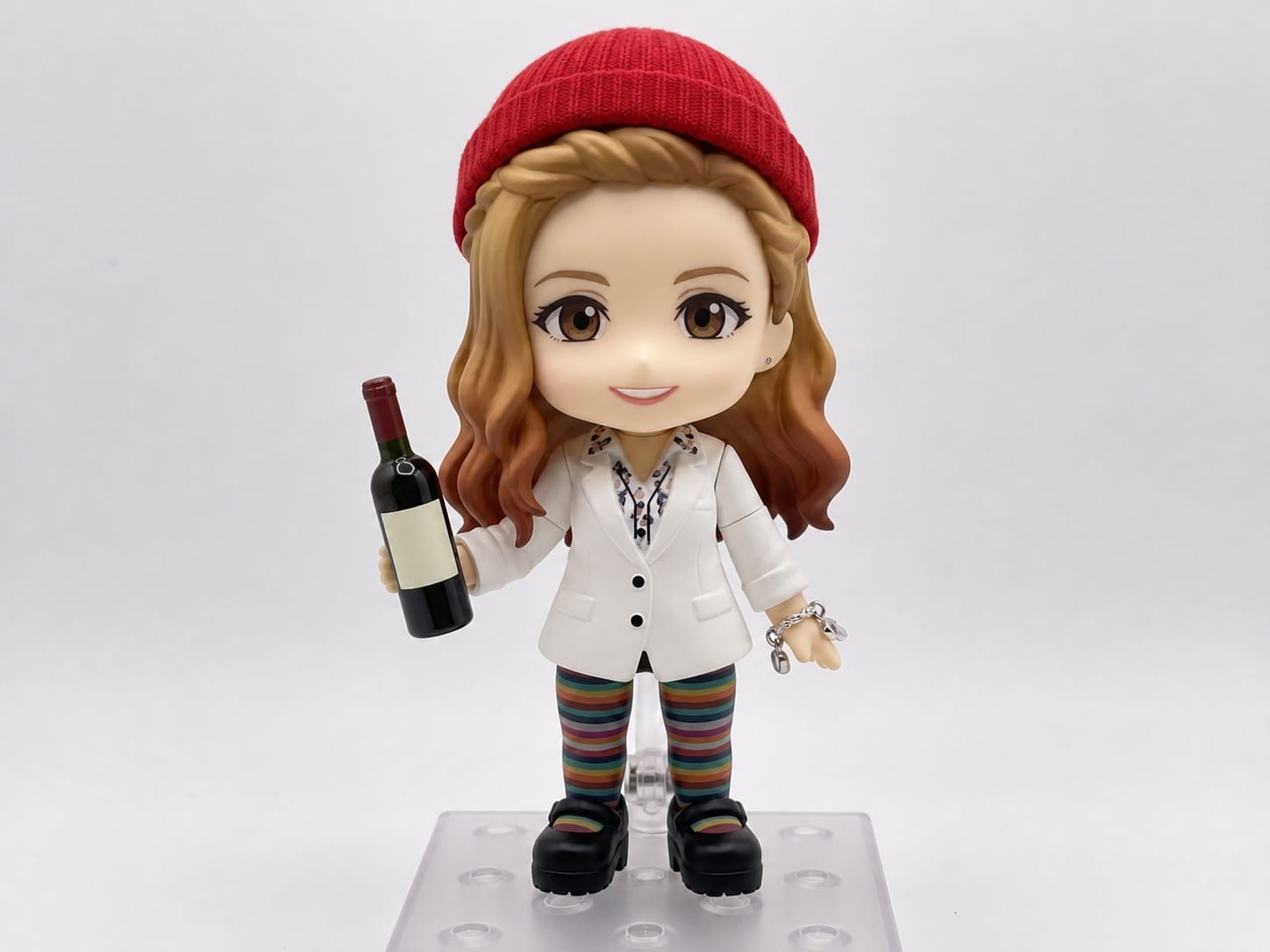 Red-beanie wine character holding a bottle of wine