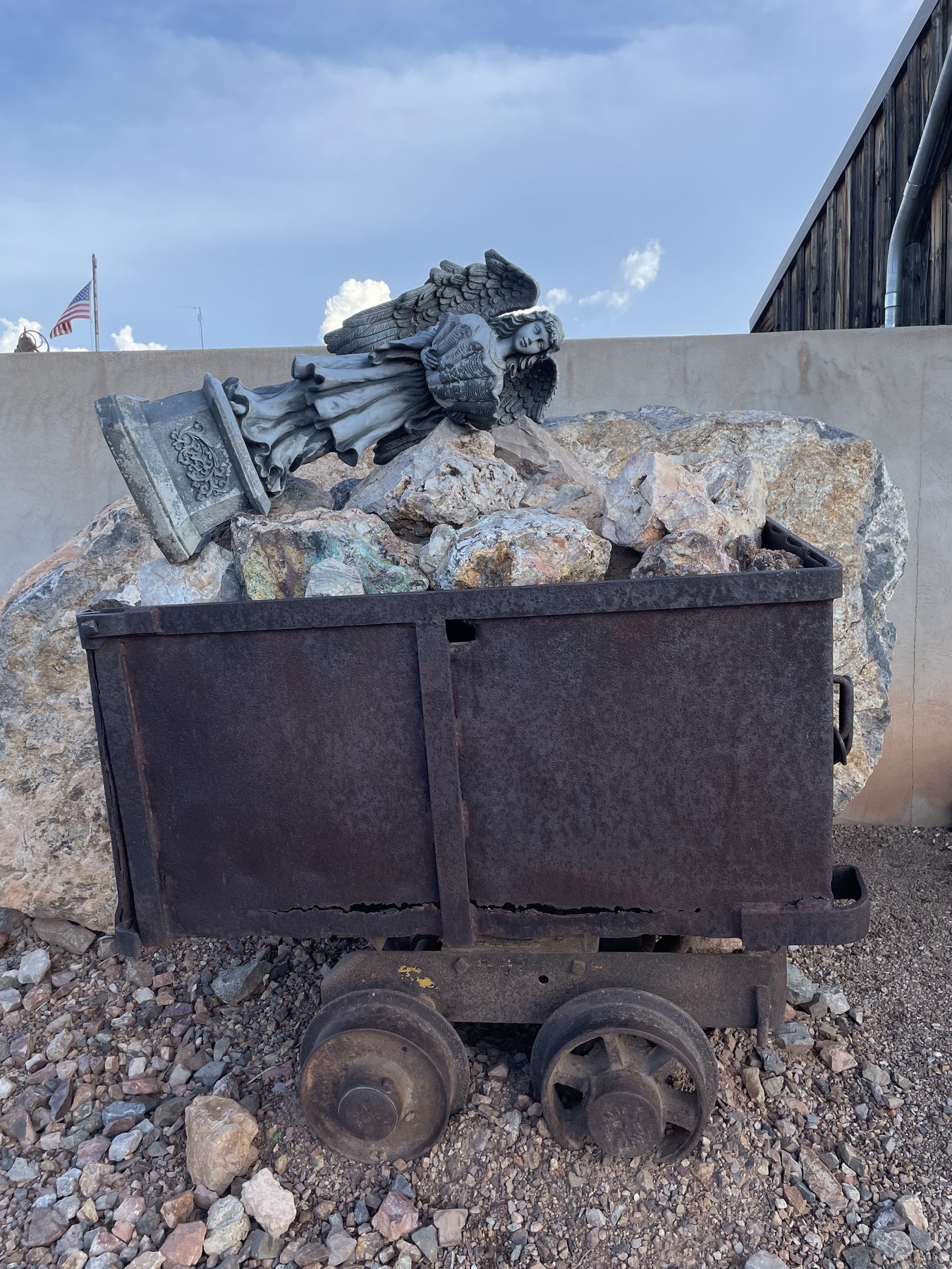 Serafina near a small mine-cart-style travel crate.