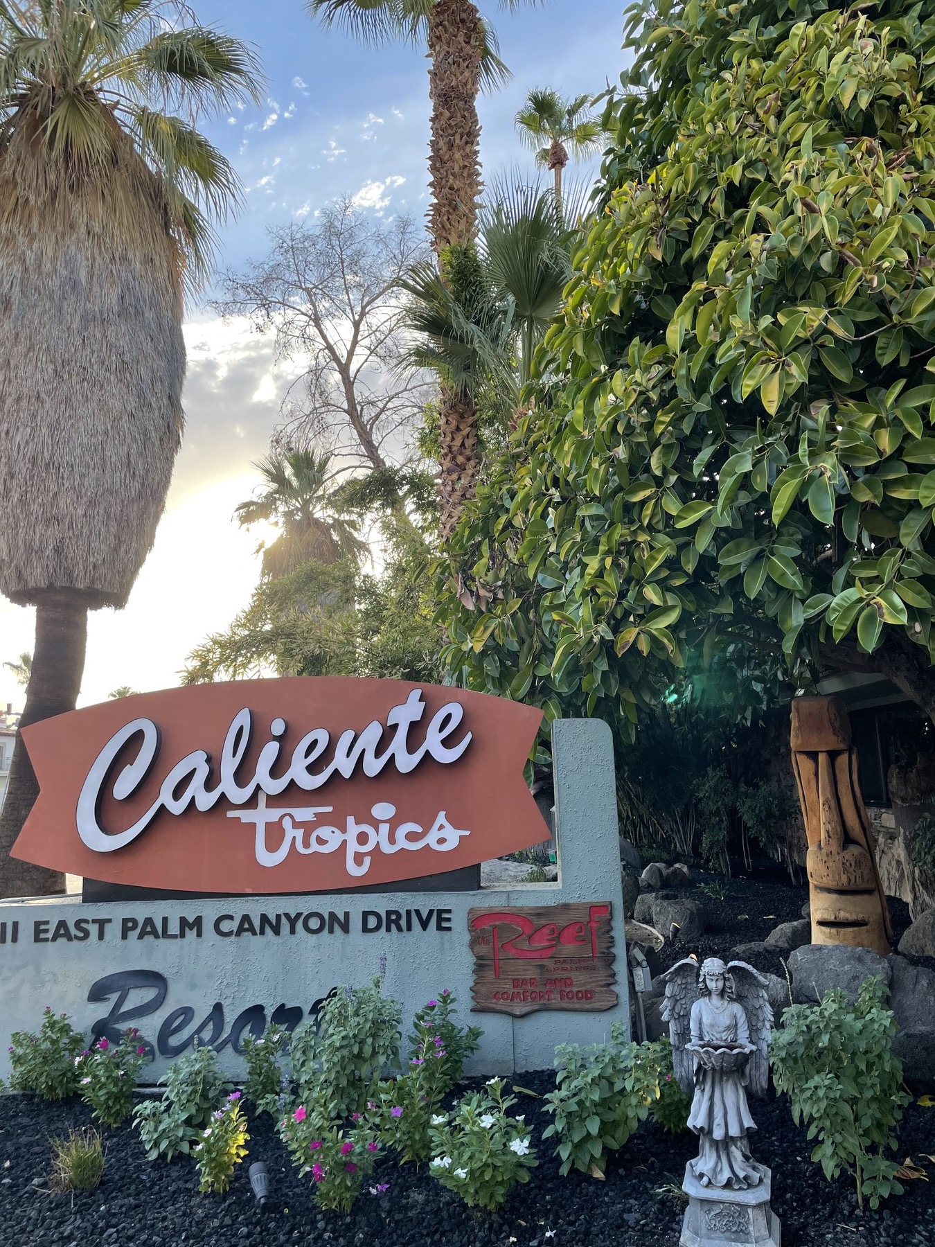 Serafina near a California roadside sign.